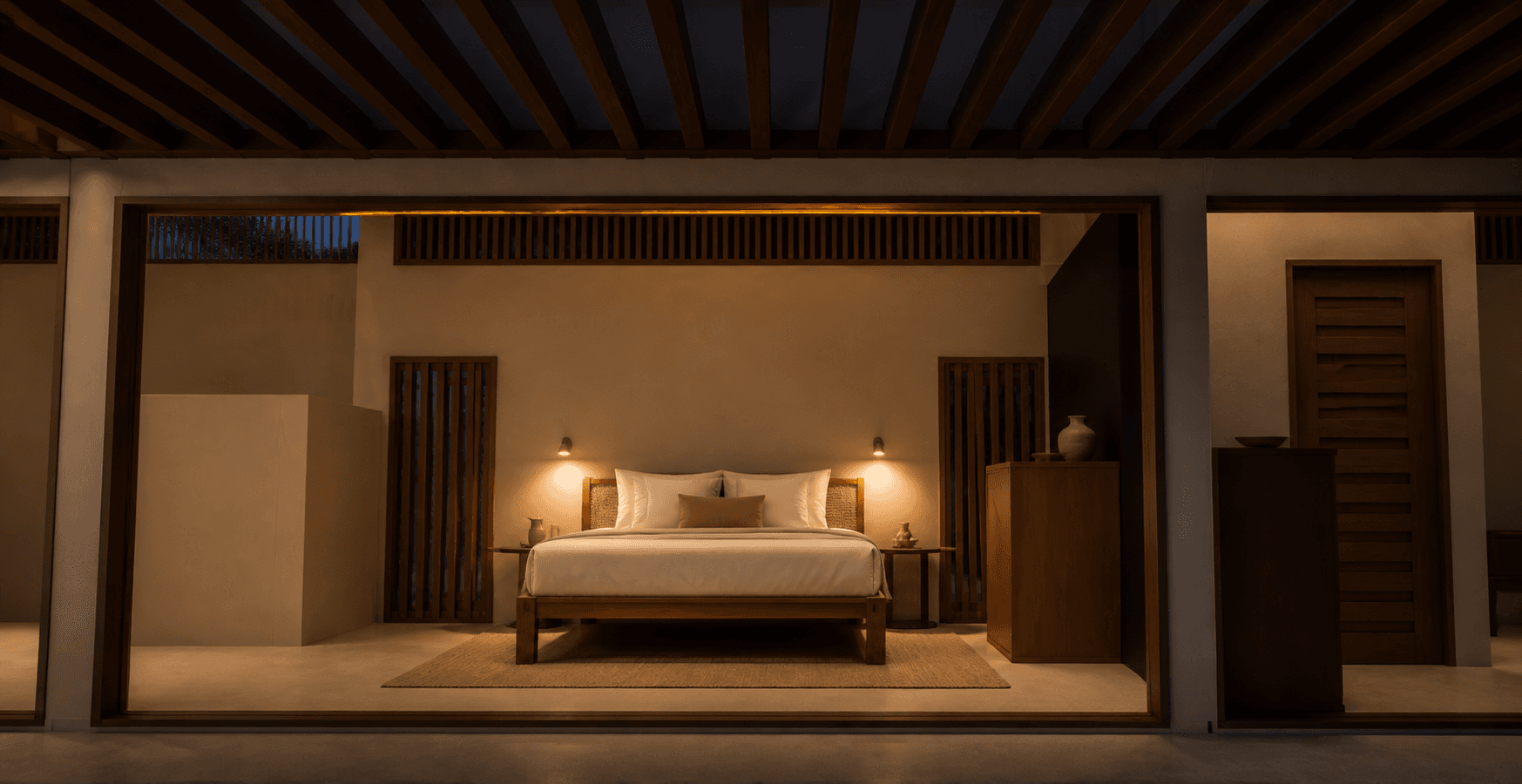 Suite parentale du Bungalow Family avec liseuses chaudes et lumière indirecte